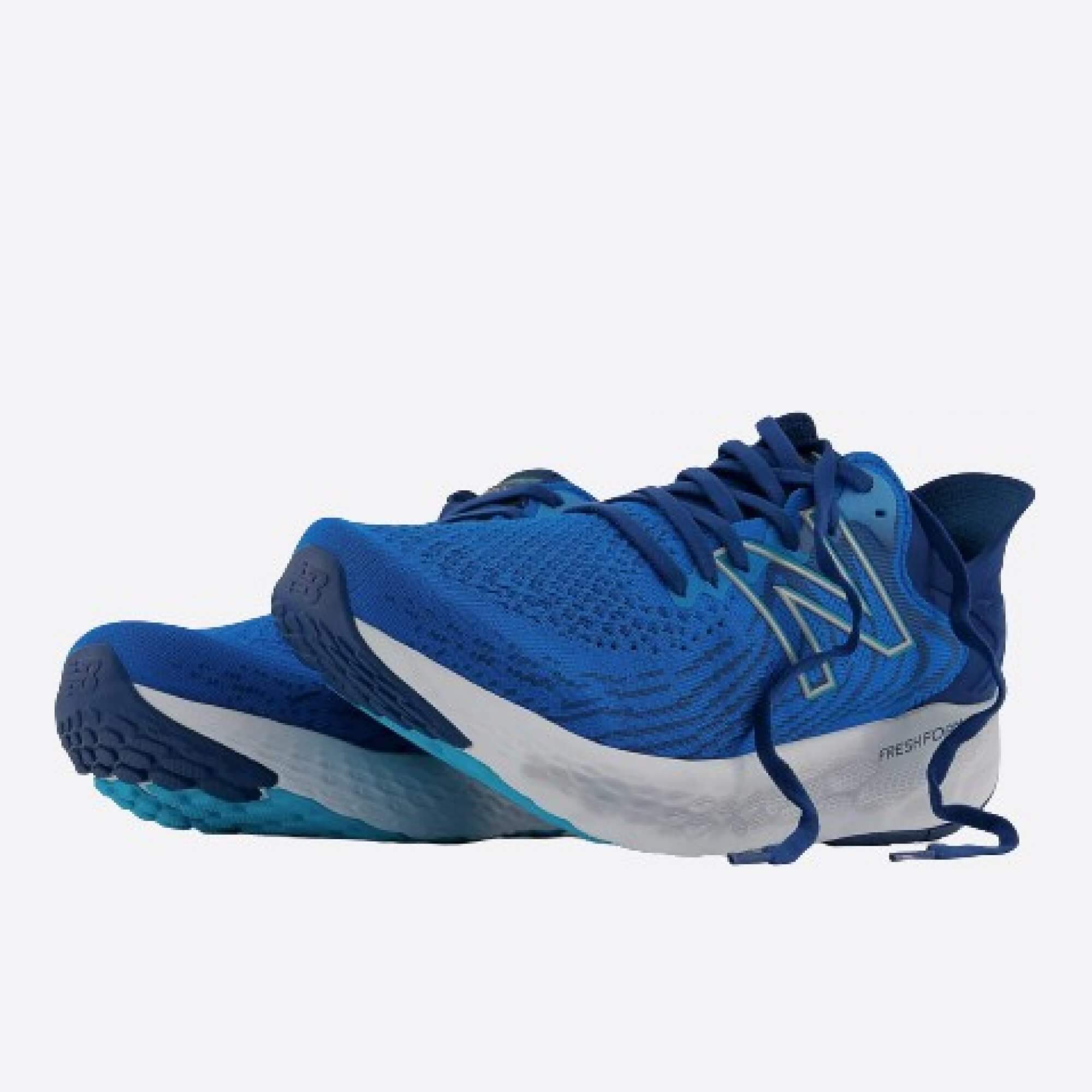 Pánske modré tenisky New Balance M1080S11 vedľa seba